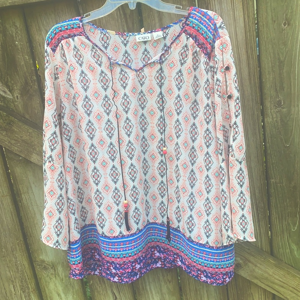 flowy, translucent blouse with button detailing